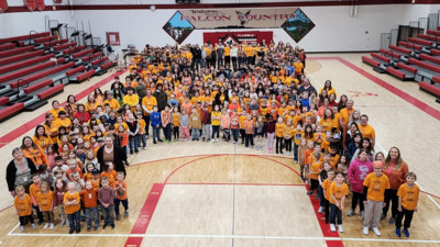 School standing in the shape of a cancer ribbon